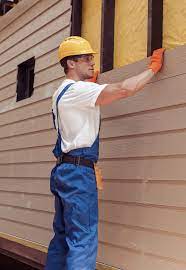 Best Custom Siding Design  in Logan, IA